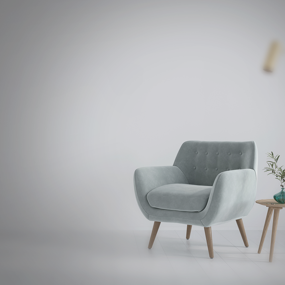 Ein moderner Sessel und ein Beistelltisch mit einer schlichten Vase